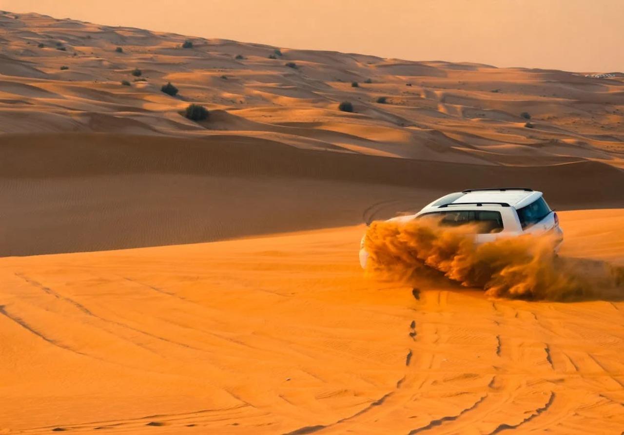 Dubai: Desert Safari, Camel Ride, Sandboard & Buffet Dinner – Dubai, United Arab Emirates