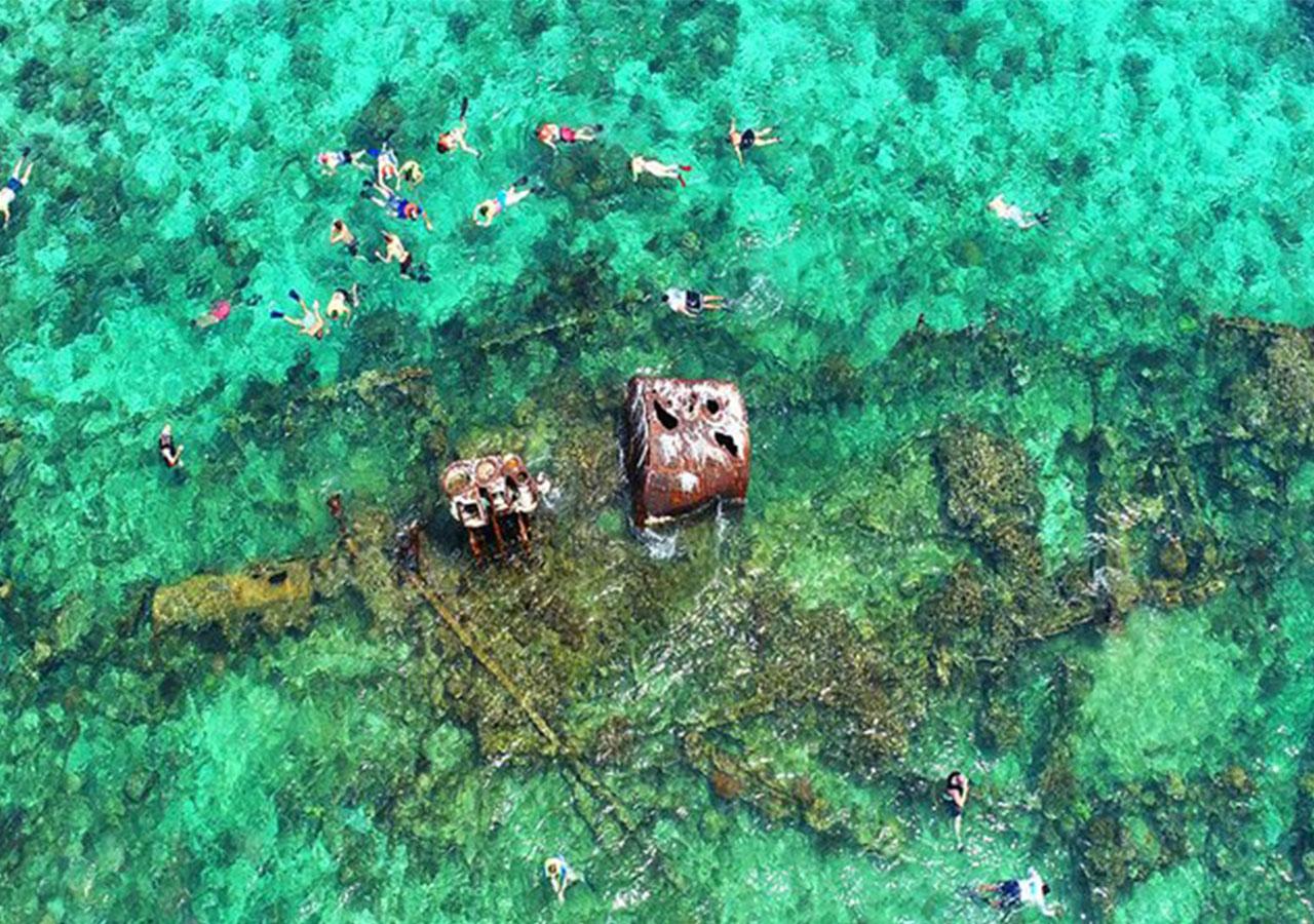 Roatan 3 Stops Snorkeling: Shipwreck, Starfish, Blue Channel – Honduras